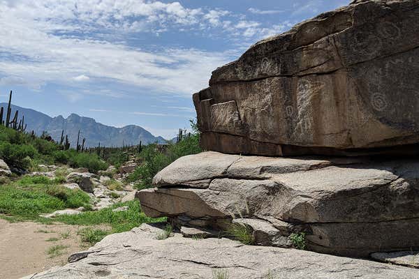 Petroglyph and markings on a boulder in Saguaro National Park near Tucson, Arizona