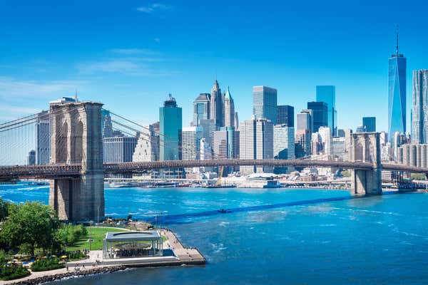 View of New York, over the Brooklyn bridge and downtown business district, located in North eastern USA, visited on the Discovery geology tour.