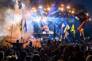 Elton John playing the piano at Glastonbury Festival in June 2023