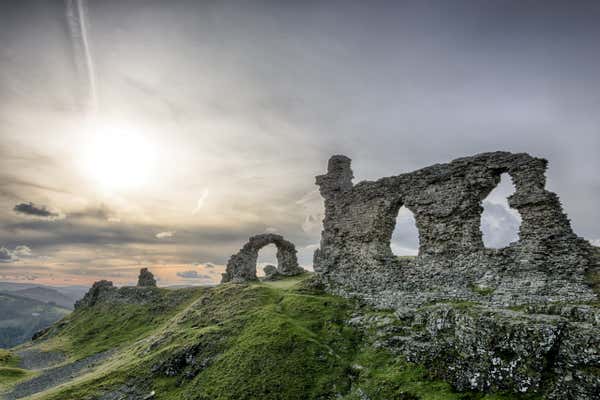 Castell Dinas Brân is a medieval castle standing high on a hill above the town of Llangollen in Denbighshire, Wales
